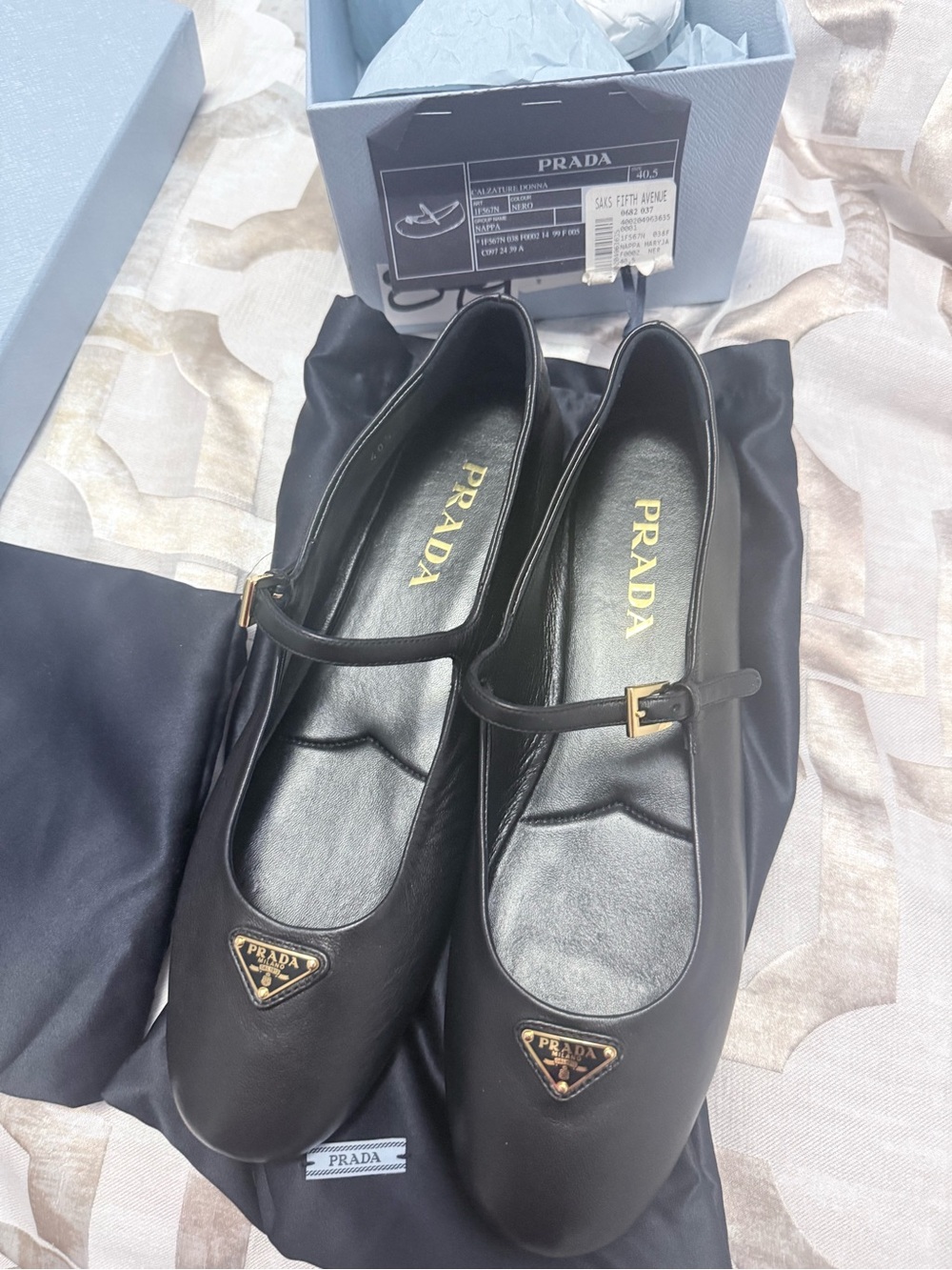 Prada Black Leather Mary Jane Flats with Gold-Tone Logo